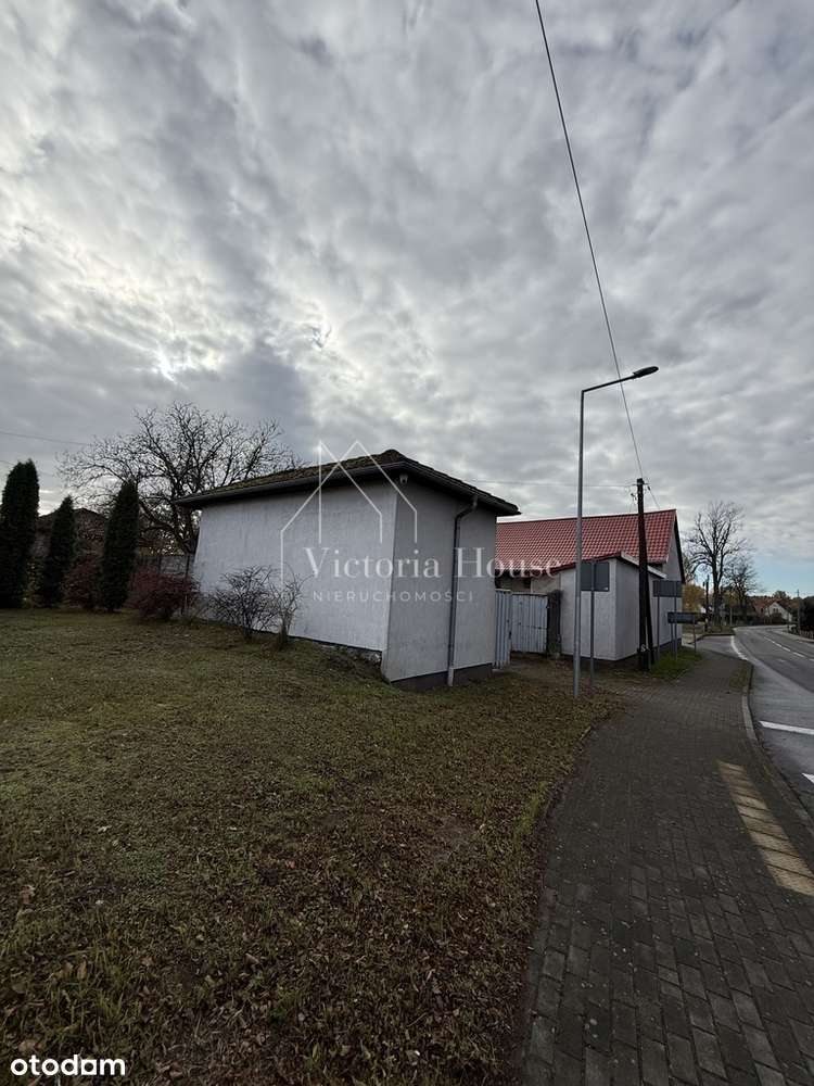 Teren usługowy z zabudowaniami.-4