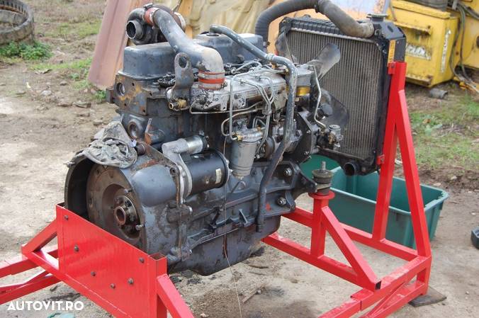 Motor buldoexcavator NEW HOLLAND - FIAT HITACHI - 3