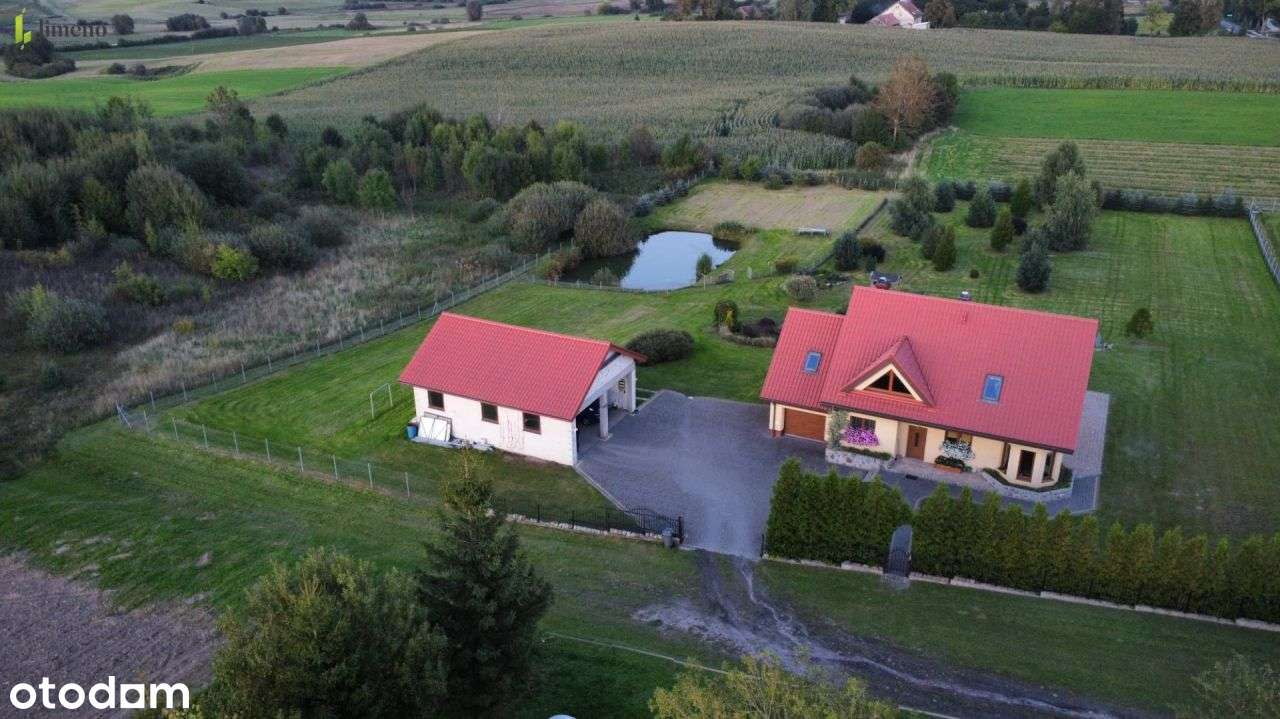 Kawał fajnej chaty ze stawem w Świątkach-12