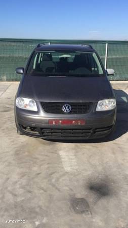 Dezmembram Volkswagen Touran 1.9 tdi,6 trepte,an fabr. 2006 - 2