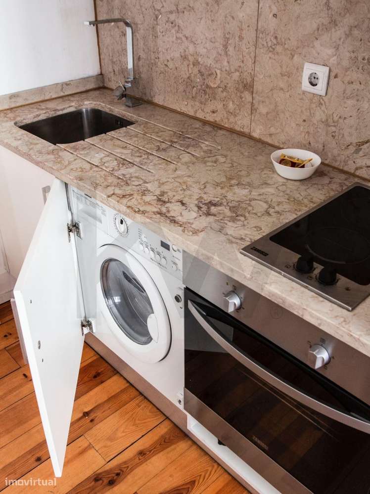 Apartamento T0 renovado na Calçada da Bica Grande - Grande imagem: 4/13