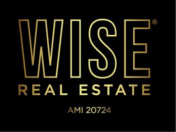 Wise Real Estate Logotipo
