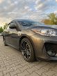 Mazda 3 2.0 MZR DISI Sports-Line - 2