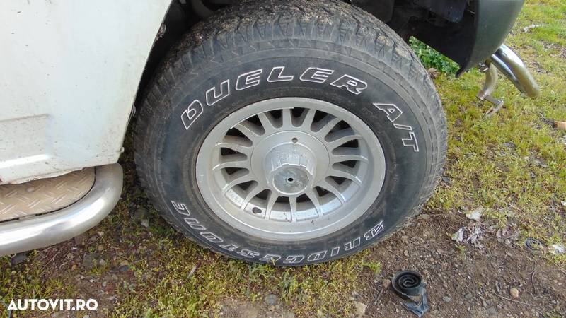 Jante aluminiu P225/75 R15 daihatzu feroza - 4