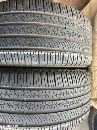 vând 2 anvelope 275/45/21 Pirelli allseason ca noi - 1