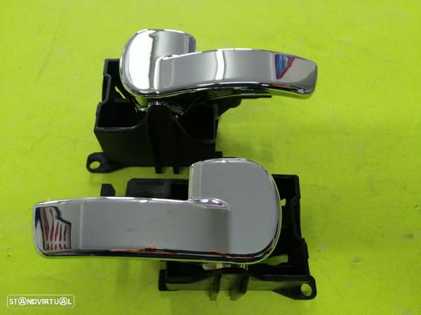 Punhos cromados interiores das portas Nissan Navara D40 NOVOS - 1