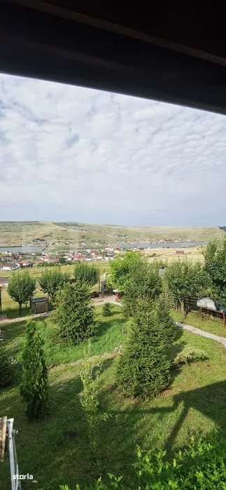 Casuta cocheta cu panorama superba asupra satului Campenesti si a lacu - Imagine principală: 3/9