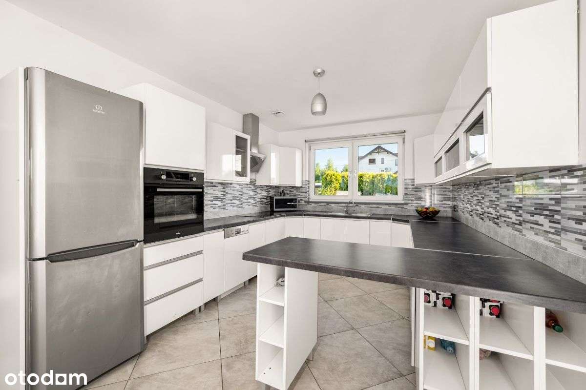 Nowoczesna parterówka otoczona zielenią i spokojem - Pełny obrazek: 4/17