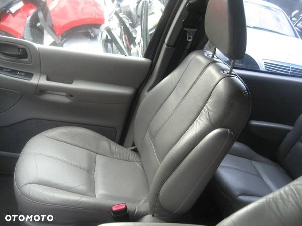 ford windstar 99-03r 3,0 benzyna v6 siedzenie fotele skóa jasna 3rzędy - 3