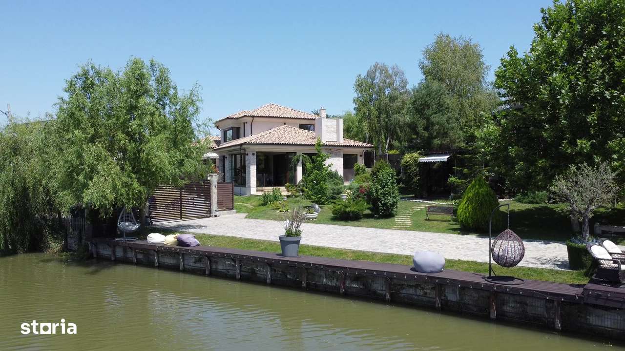 Imobil de lux pe malul lacului cu ponton, complet mobilat si utilat-0