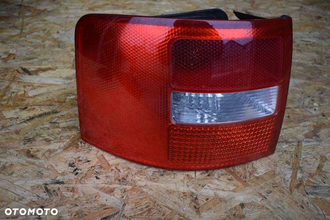 LAMPA TYŁ LEWA AUDI A6 C5 ORYGINAŁ 4B9945095F - 1