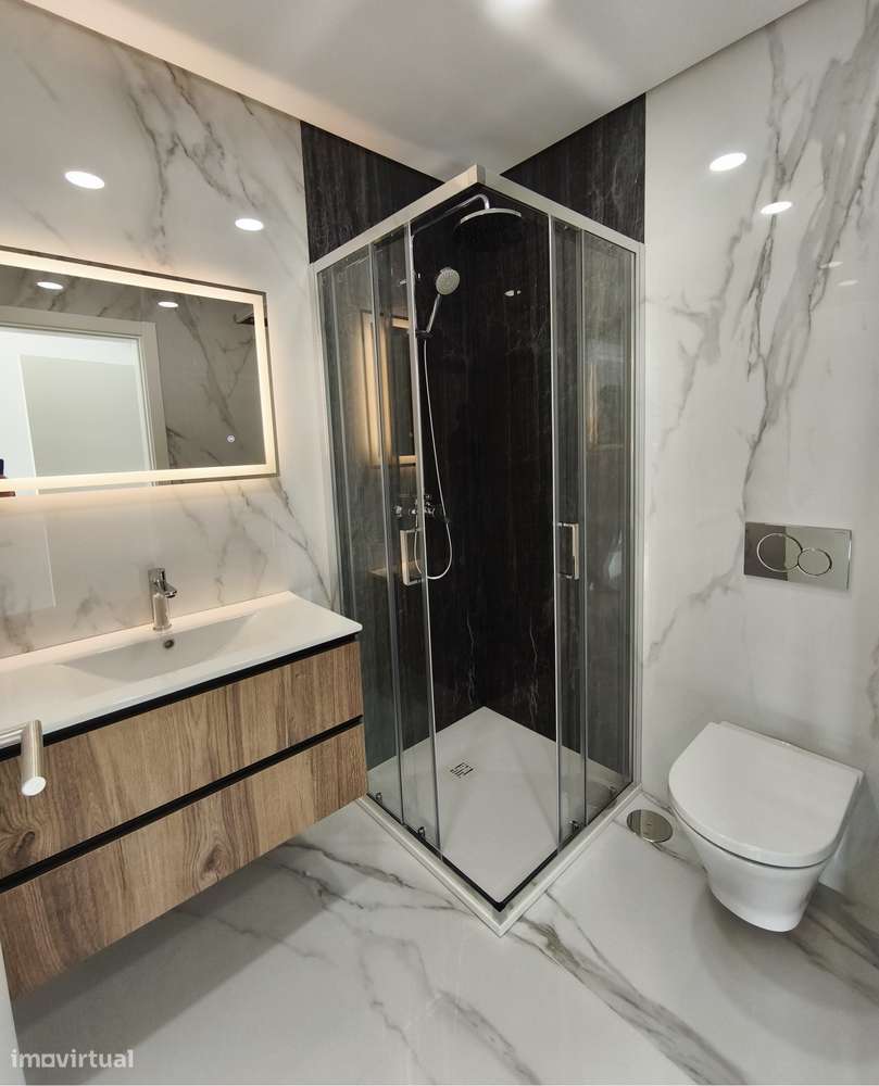 Apartamento T4 Novo c/ Garagem e um parque de Estacionamento-7