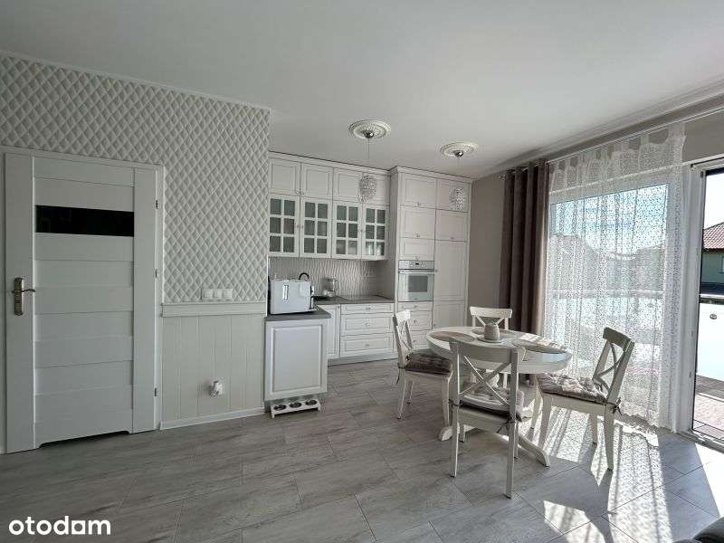 Dwupoziomowy apartament z dużym tarasem i miejscem postojowym.-2