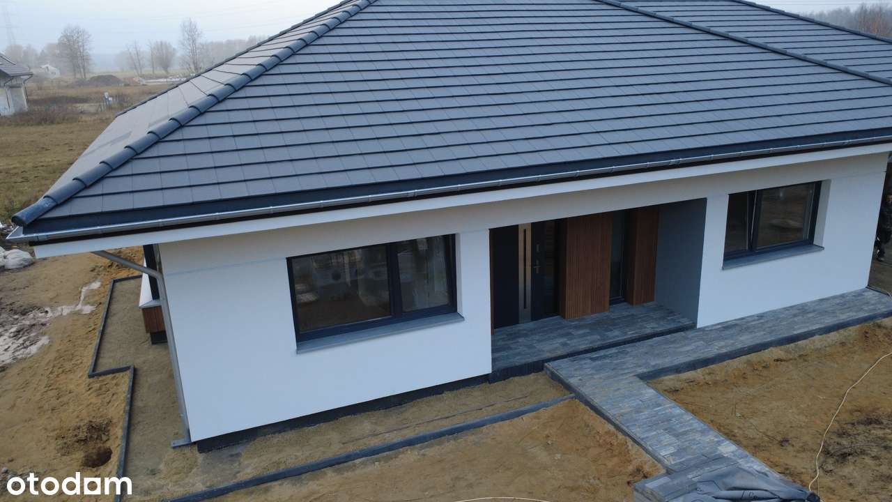 Nowoczesny dom parterowy z podwójnym garażem w zacisznej okolicy - Pełny obrazek: 4/16