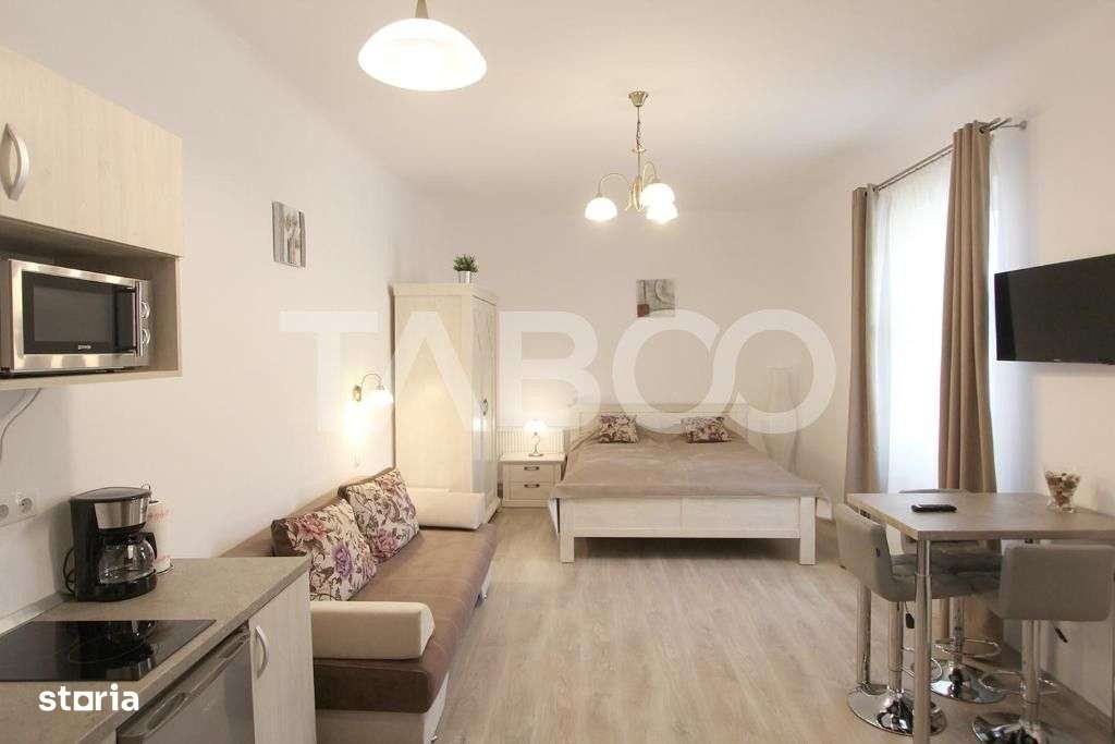 4 garsoniere pregatite pentru regim hotelier in Centrul Istoric Sibiu - Imagine principală: 1/19
