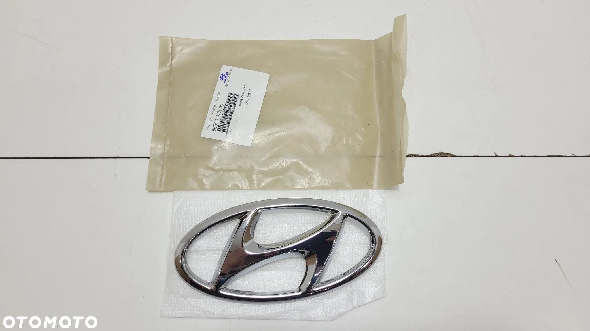 Hyundai I10 emblemat przód 86300K7000 - 1