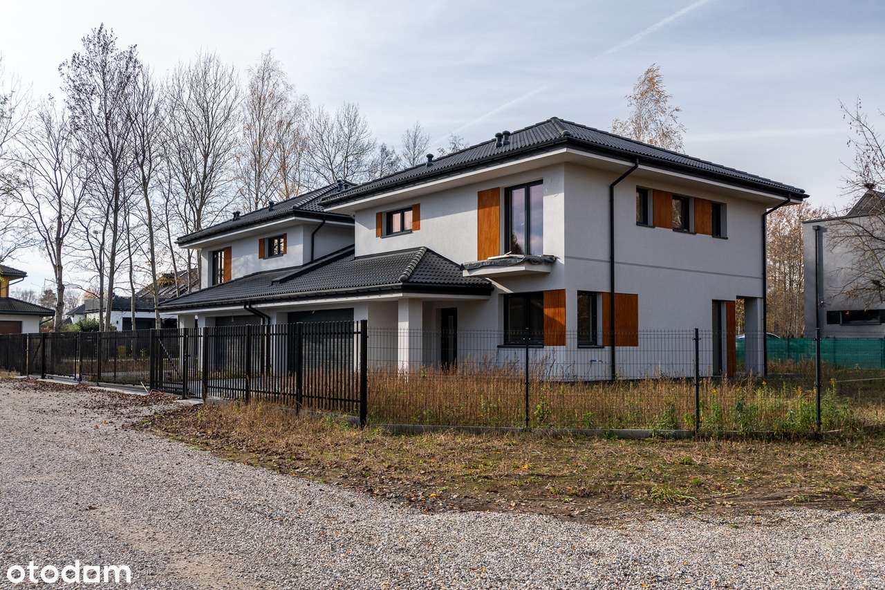 Duży bliźniak łączony 2-stan. garażem, niedaleko szkoła oraz trasy S7-1