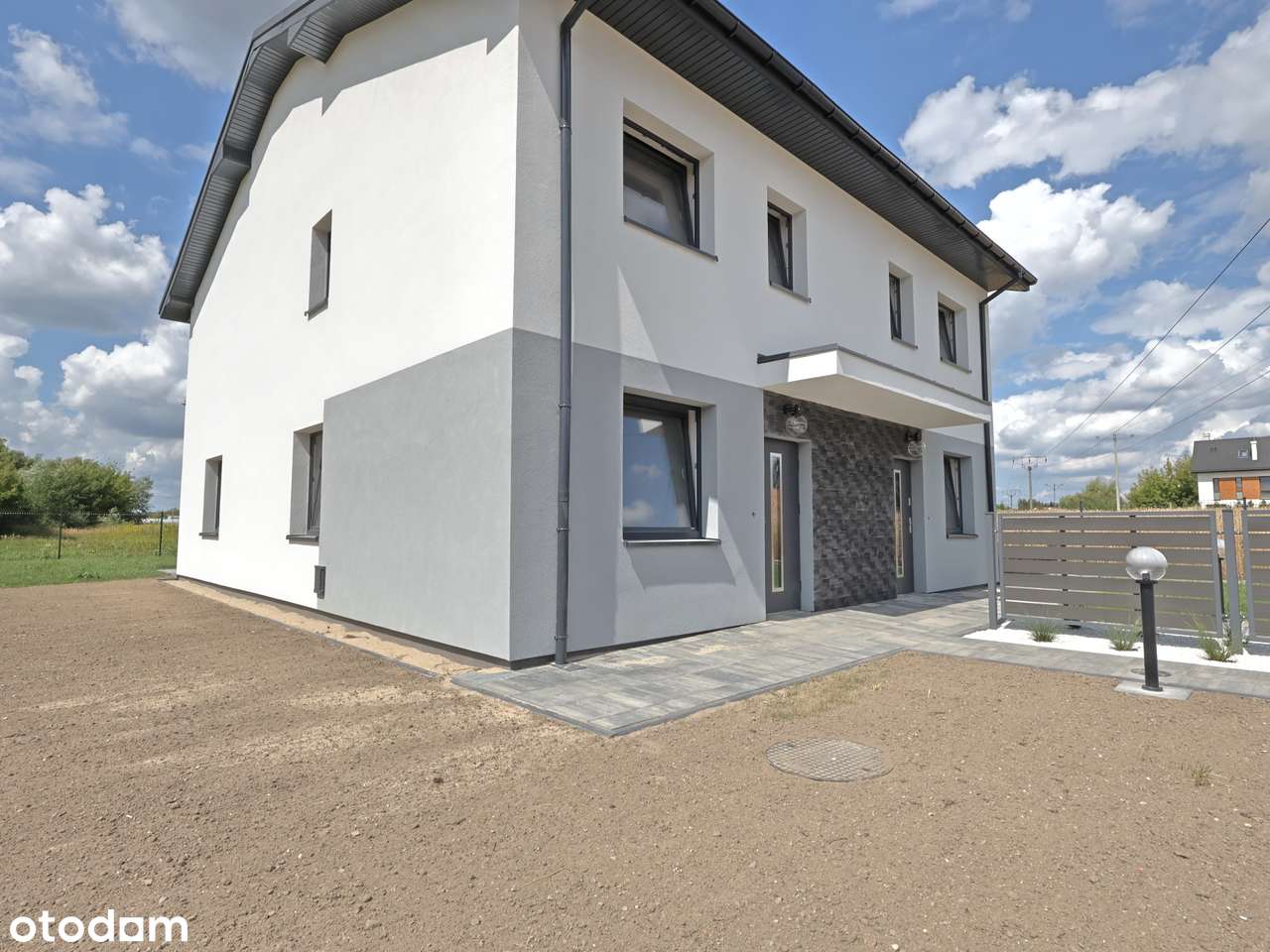 Nowoczesny dom w zabudowie bliźniaczej - Słomin-15