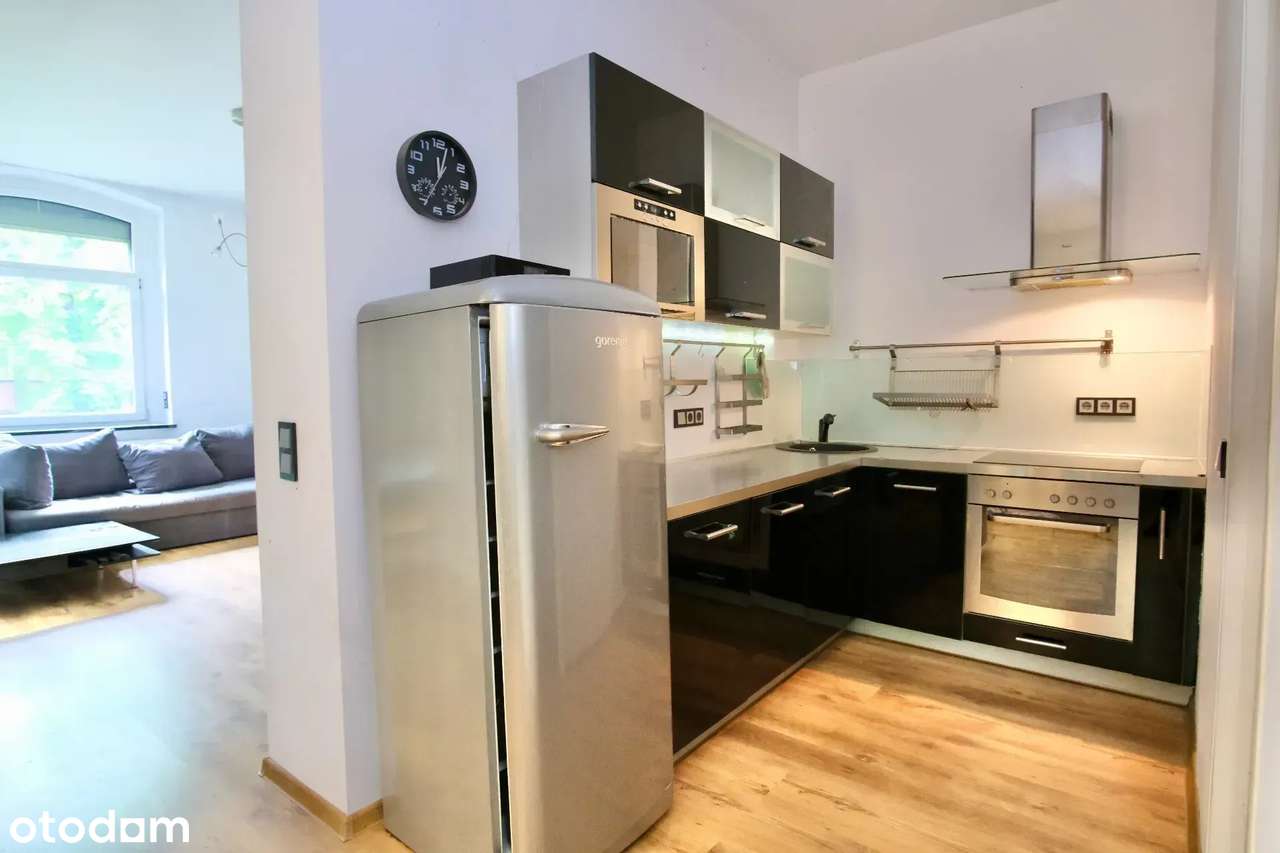 Mieszkanie dwupoziomowe z ogródkiem i wiatą - Pełny obrazek: 5/19