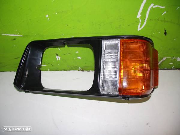 Aro do Farol Esquerdo Com Pisca Mitsubishi L300 - 1987 / 1993 - NOVO - FR1390 - 1