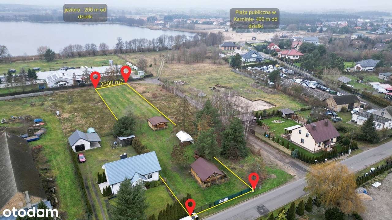 Działka z domkami letniskowymi nad jeziorem-0