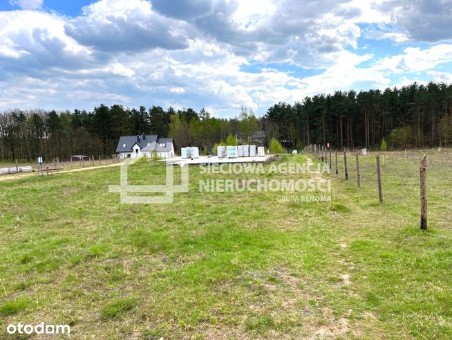 Działka z rozpoczętą budową, 130 M od jeziora.