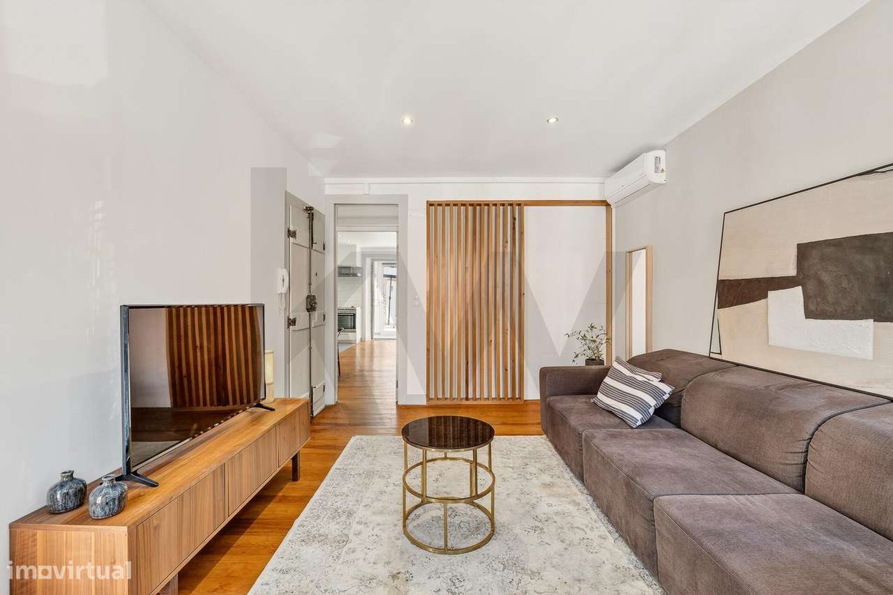 Espaçoso T1 remodelado com terraço exclusivo, em prédio histórico | Al - Grande imagem: 3/27