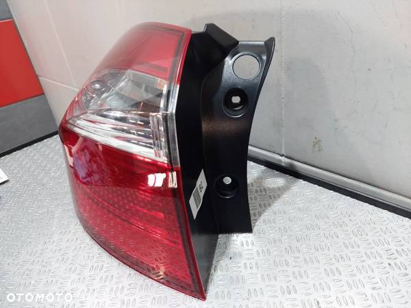 LAMPA TYŁ LEWA W BŁOTNIK KIA RIO III 3 LIFT R2016 5DRZWI - 3