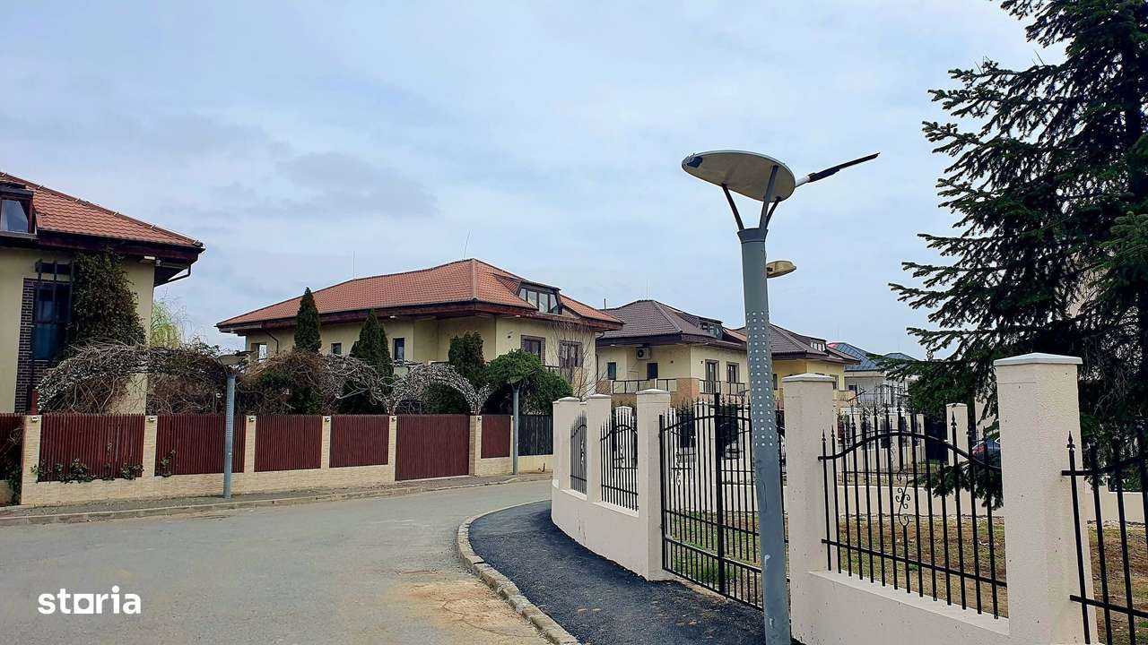 Casa de închiriat: Cartier privat, zona lacurilor Crevedia Buftea. - Imagine principală: 3/16