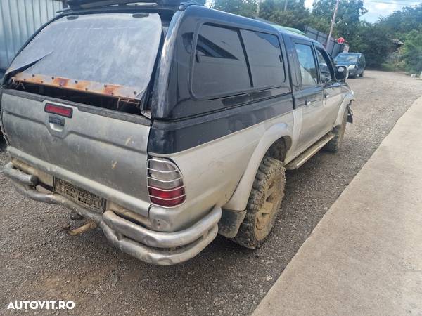 Dezmembrez Mitsubishi L200 an 2006 euro 3 4D56 85 KW volan stanga - 6