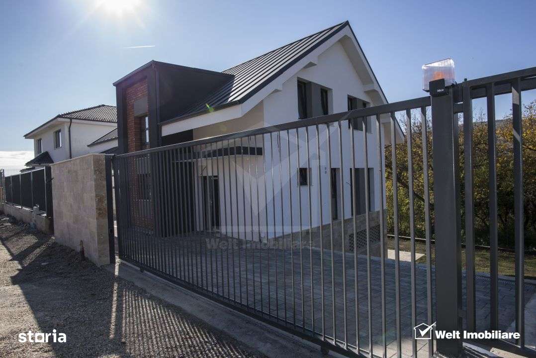 Casa individuala moderna in centrul comunei Chinteni–confort, spatiu - Imagine principală: 3/19