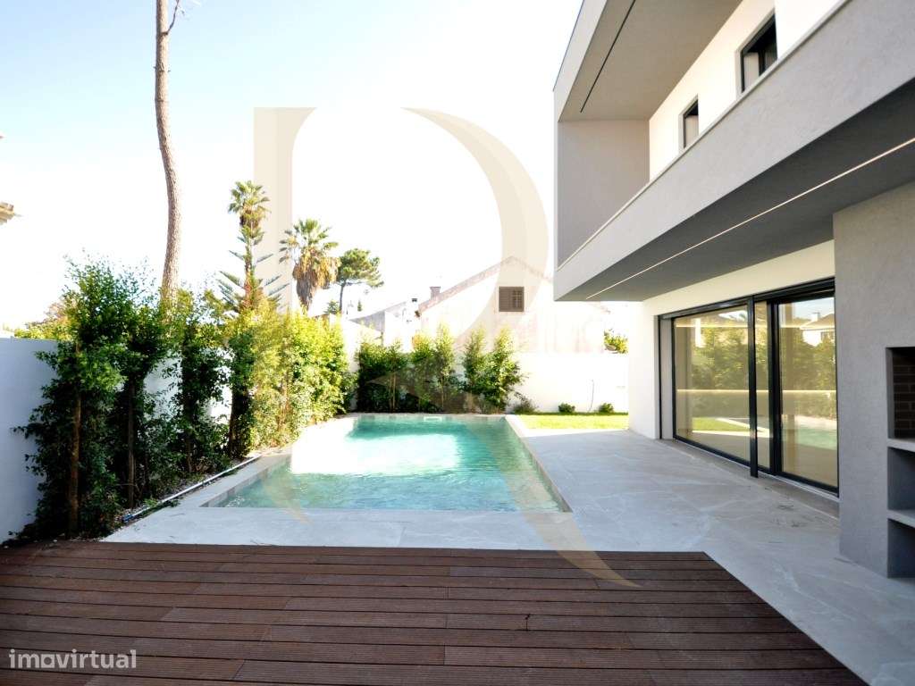 Moradia T3 isolada com piscina, churrasqueira e garagem na Aroeira-15