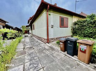 Casa de vanzare cu 5 camere, 2 bucatarii si 3 bai, 110 mp utili