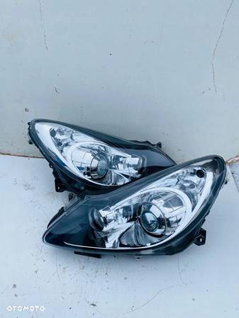 LAMPY PRZEDNIE REFLEKTORY OPEL CORSA D SOCZEWKA SKRĘTNA AFL IDEALNE - 1