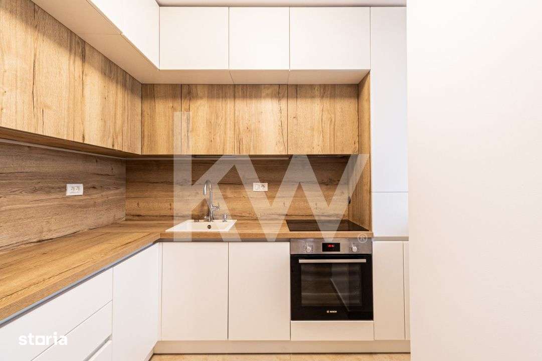Apartament modern, 3 camere, garaj subteran + boxa - Racadau-12