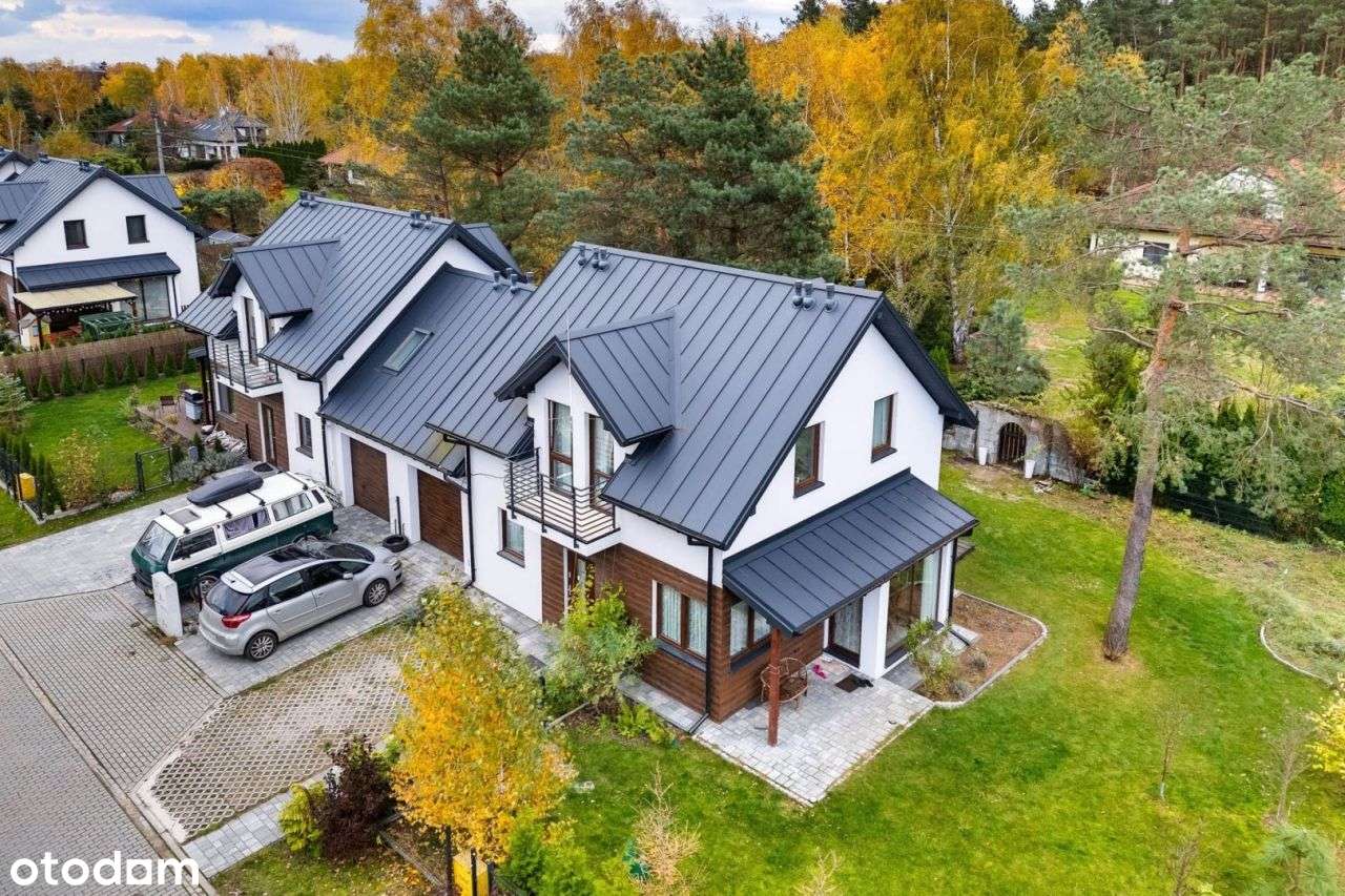 Przestronny dom z ogrodem i garażem!-0