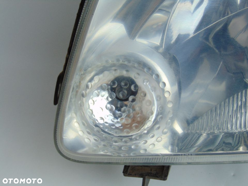 Oryginalna lampa przednia przód lewa Daihatsu Move 01-05r Europa - 2