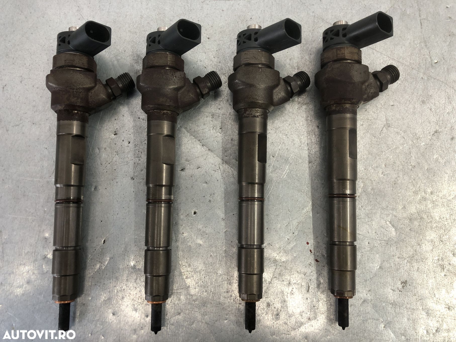 Injector VW Passat B7 Variant 2.0 TDI manual 140 CP - 1