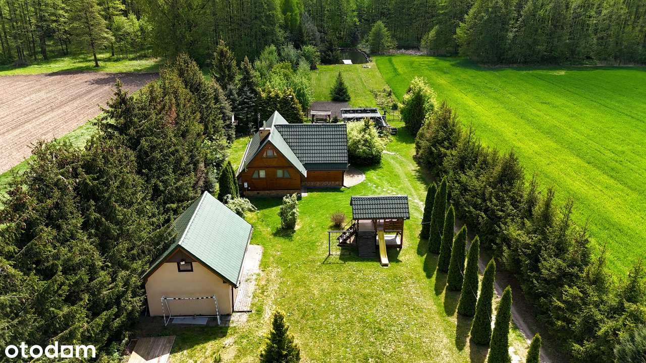 Klimatyczny dom na malowniczo zagospodarowanej działce | staw | las-10