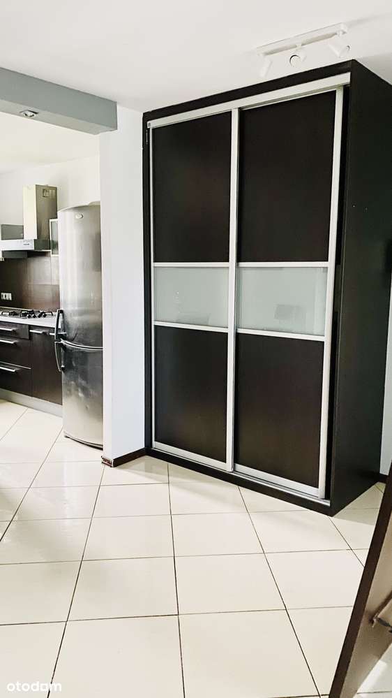 Przestrzeń i wygoda dla rodziny – dwupoziomowe mieszkanie w Dąbrowie - Pełny obrazek: 4/12