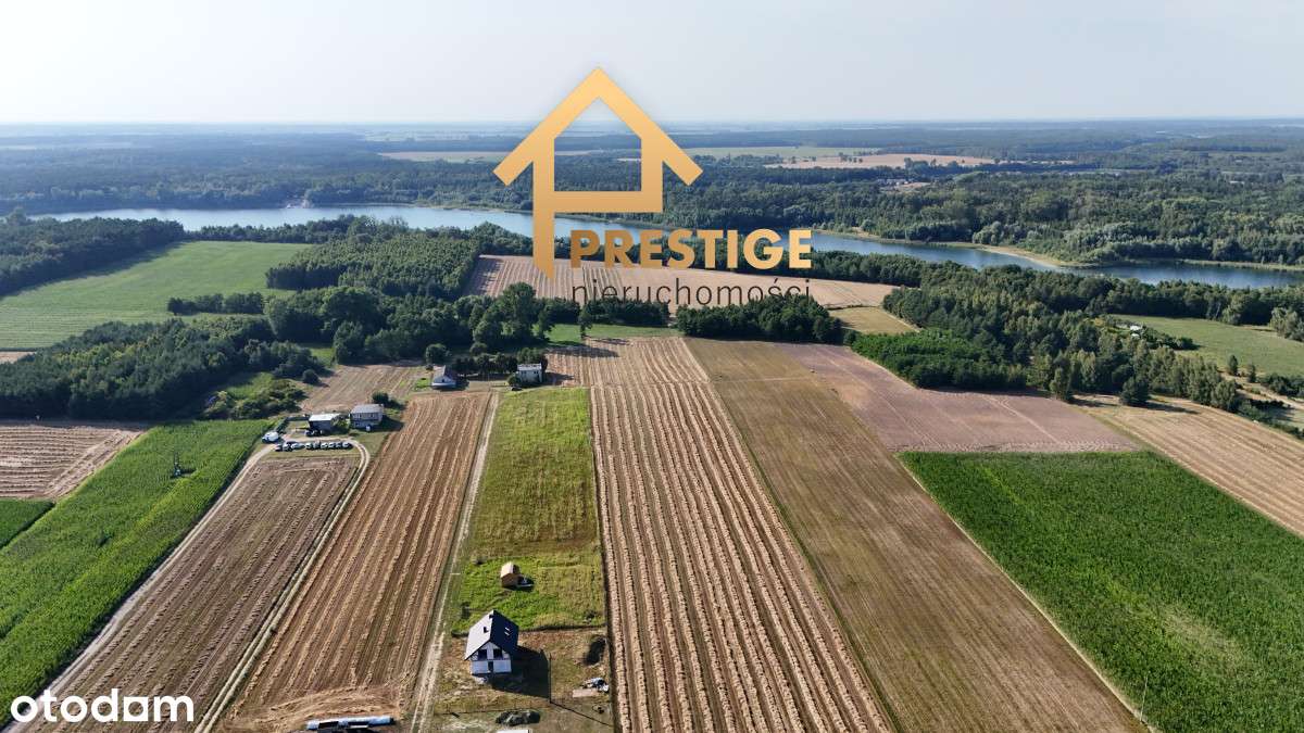 Dom w stanie surowym otwartym blisko jeziora.-1