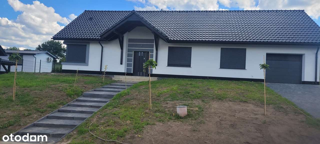 Dom wolnostojący w stanie surowym otwartym