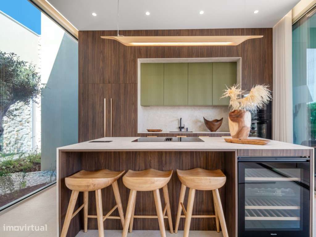 Moradia de extraordinária qualidade junto à lagoa, golfe e praia-8