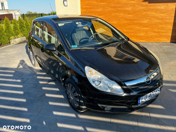 Opel Corsa 1.2 16V Cosmo - 12