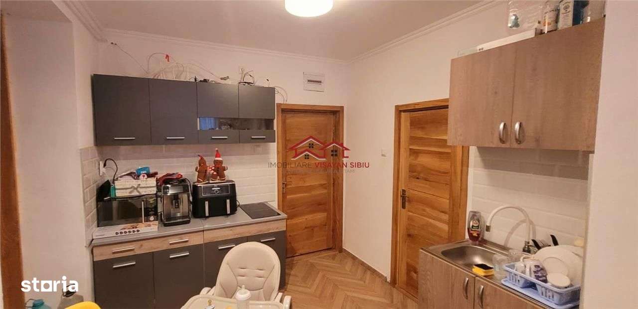 apartament spatios la casa cu gradina,Cisnadie,comision 0-9