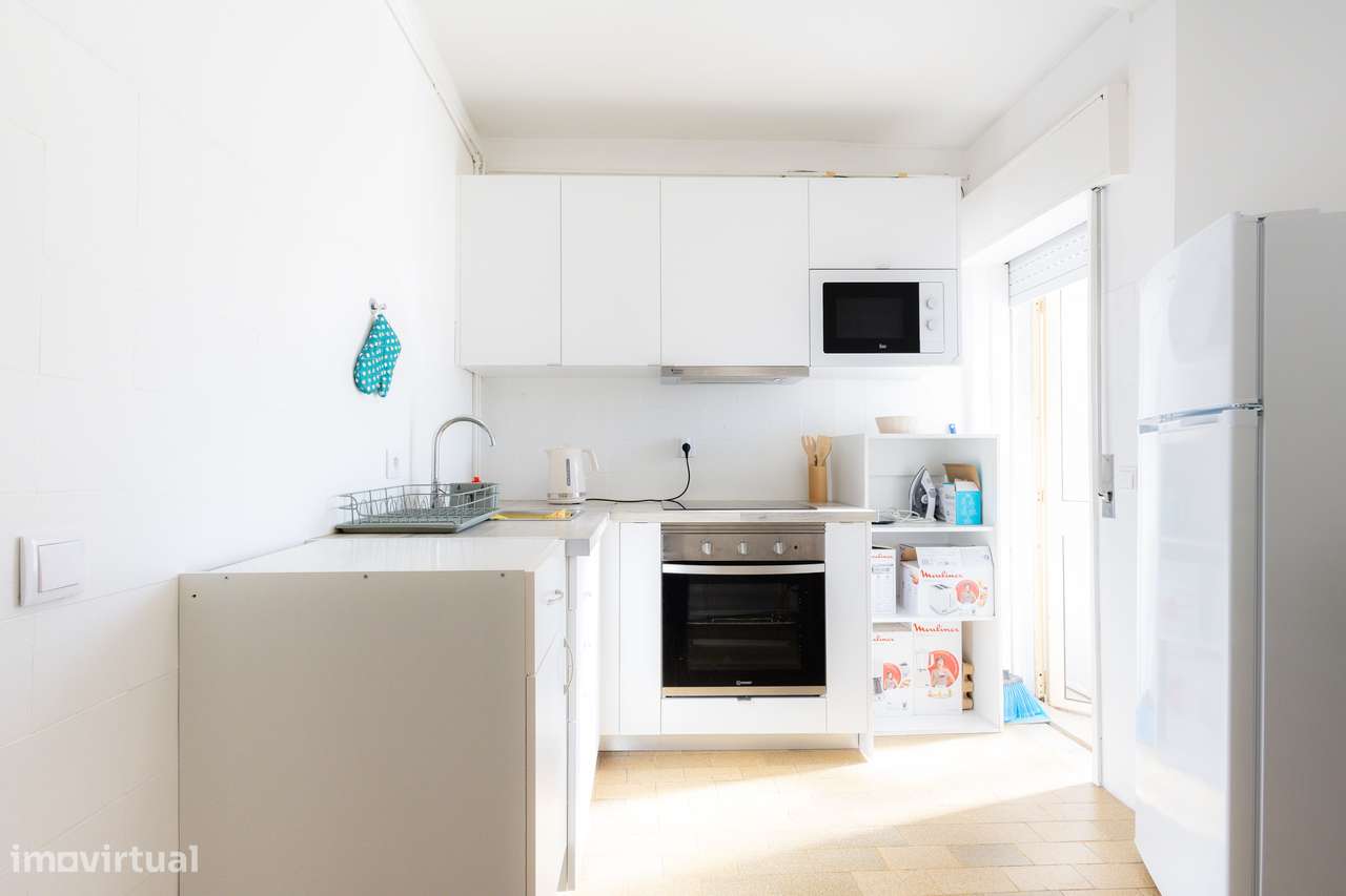 T2 com varanda, garagem e localização central-2