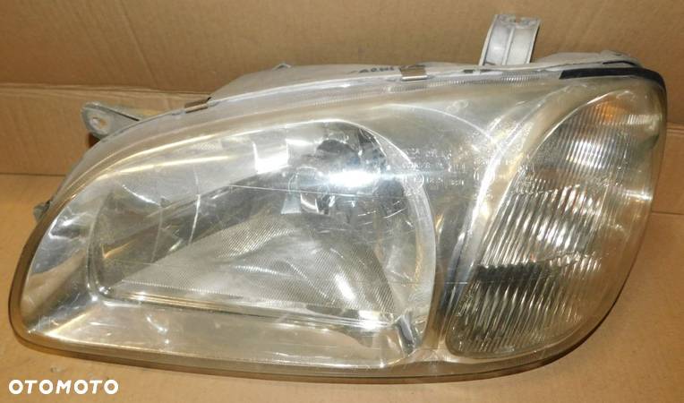 lampa prawa lewa przód KIA CARNIVAL I SEDONA  98-00  EUROPA - 4