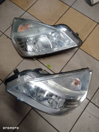 LAMPA REFLEKTOR LEWY I PRAWY PRZEDNI RENAULT ESPACE IV LIFT 8200394702, 8200394704 - 4