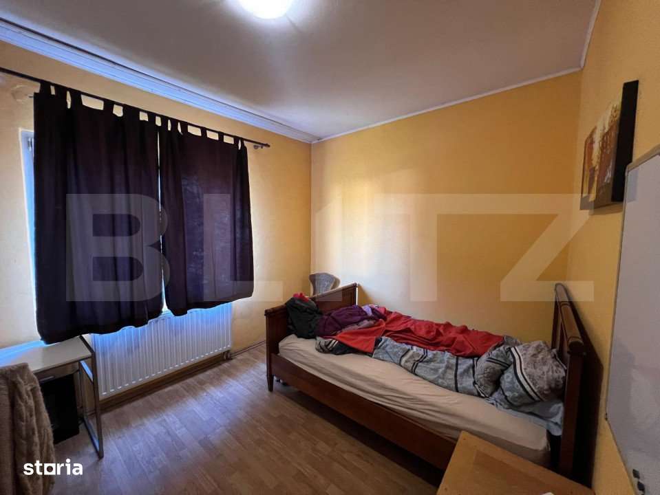 Casa tip P+1, cu 2 apartamente,  pe strada George Calinescu - Imagine principală: 3/5