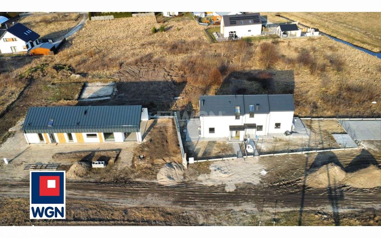 Bliźniak z pompą ciepła i ogrodem w zielonej częśc-6